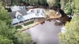 Lee's Landing man builds dam around home to protect it from flooding
